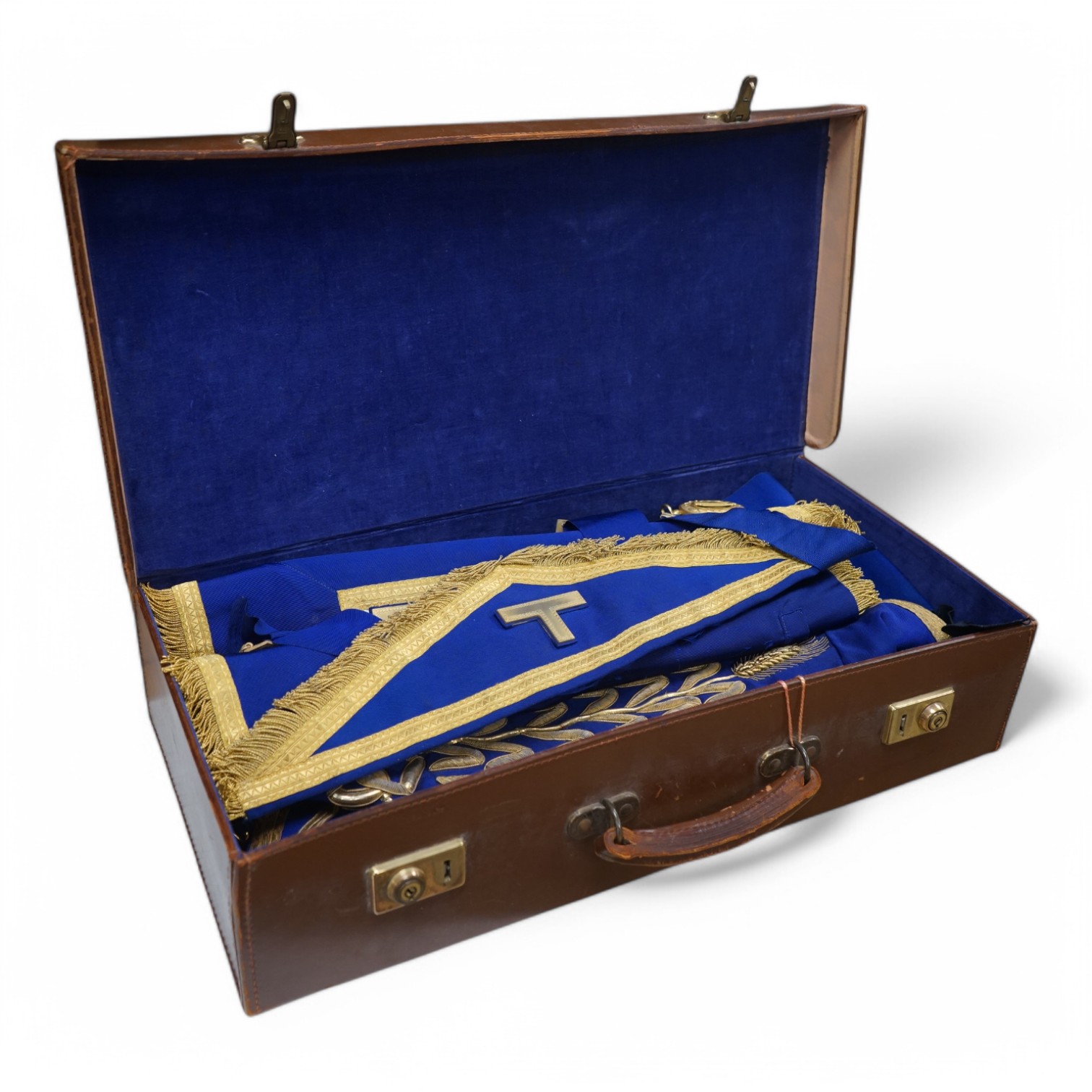 A suitcase containing Masonic related items including apron, sash etc. Condition - fair to good